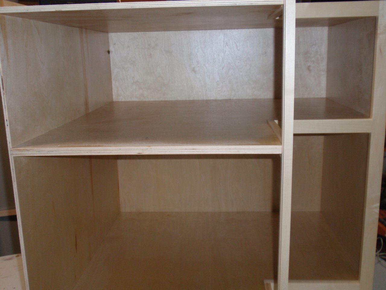 Cross section view of an easy reach lazy susan cabinet