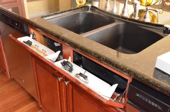 Kitchen sink tilt-out trays