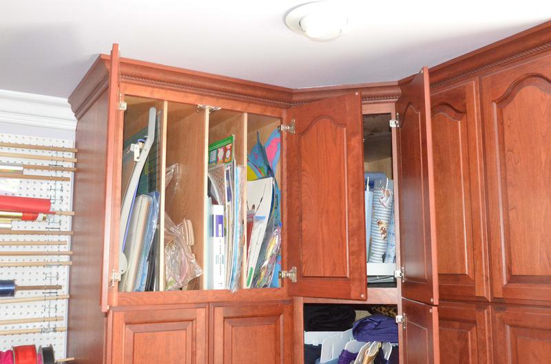 Craft room cabinet with vertical dividers
